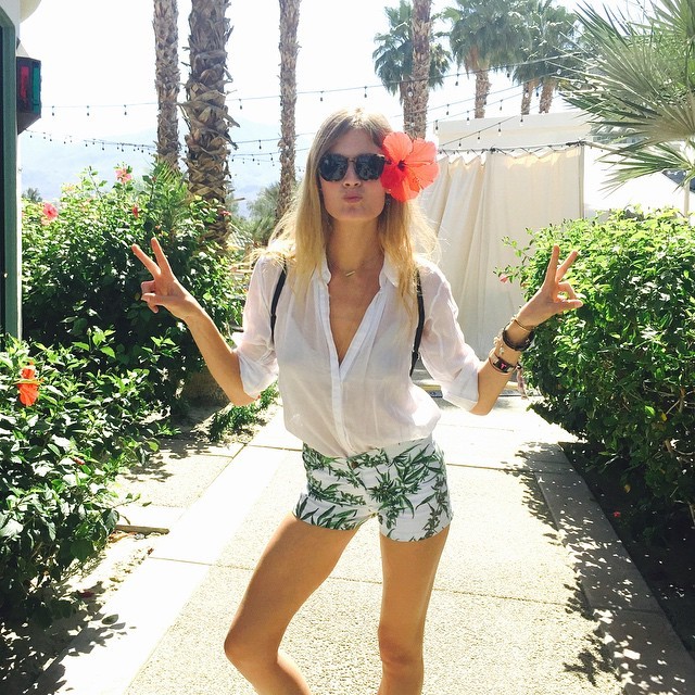 Constance Jablonski is ready for Coachella in a white shirt and printed shorts