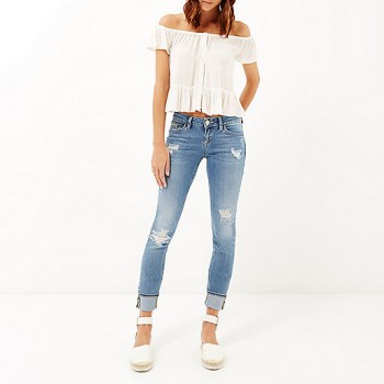 Mid wash ripped Daisy slim jeans