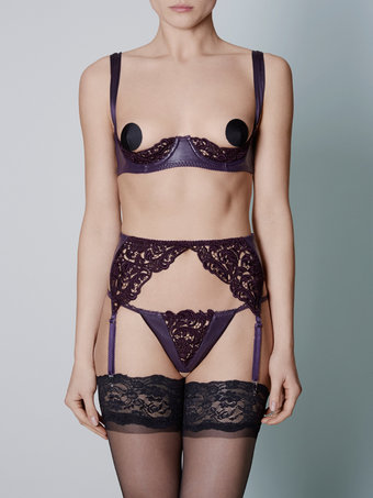 Wrap your hips in the soft embrace of lambskin leather with the beautifully opulent Damson Suspender Belt from Loveday London. Framing your body in ornate guipure lace, this deep purple suspender belt is perfect for long winter evenings with your lover.