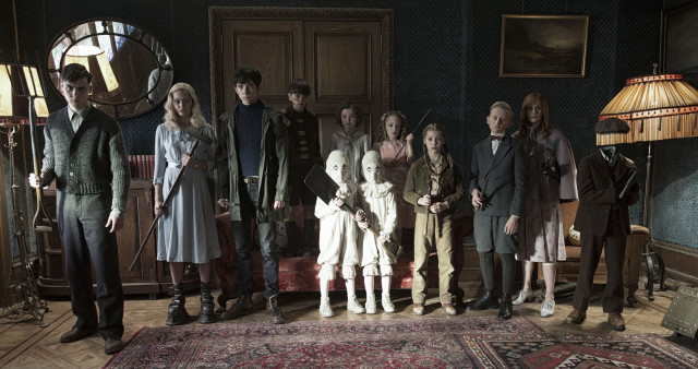 The residents of MISS PEREGRINE’S HOME FOR PECULIAR CHILDREN ready themselves for an epic battle against powerful and dark forces. Left to right: Enoch (Finlay Macmillan), Emma (Ella Purnell), Jake (Asa Butterfield), Hugh (Milo Parker), Bronwyn (Pixie Davies), the twins (Thomas and Joseph Odwell), Claire (Raffiella Chapman), Fiona (Georgia Pemberton), Horace (Hayden Keeler-Stone), Olive (Lauren McCrostie), and Millard (Cameron King). Photo Credit: Jay Maidment.