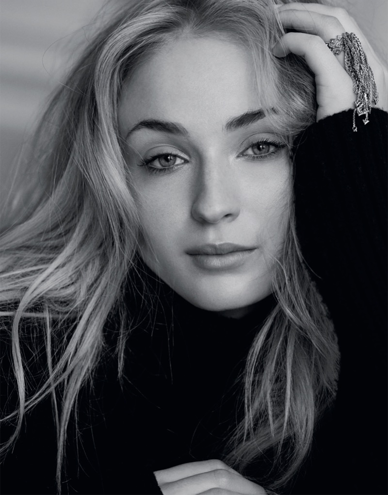 Getting her closeup, Sophie Turner wears a Louis Vuitton turtleneck sweater and ring