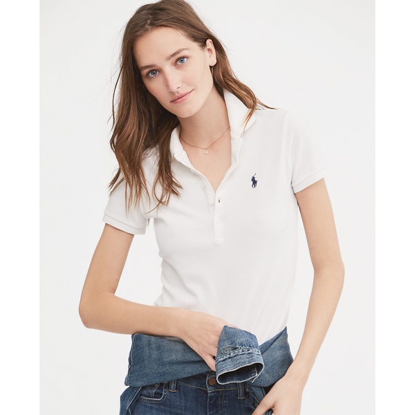 Introduced in 1972, our Polo shirt now comes in a variety of colors and styles but remains just as iconic as the original. This stretch cotton mesh version features a body-conscious silhouette, a sexy half-placket, and our signature embroidered pony. Team it with everything from jeans to a ballgown skirt.