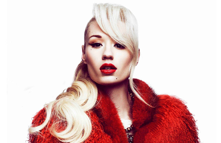 Iggy Azalea makes chart history and joins The Beatles as the only two acts to have ever hit the #1 and #2 spots simultaneously