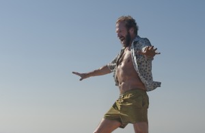 Ralph Fiennes takes ‘Embarrassing Dad’ to the Next Level in First Clip from ‘A Bigger Splash