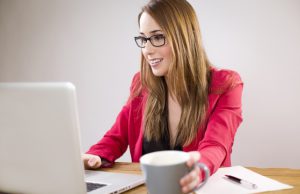 Three Top Tips for First-Time Online Daters Online Dating women using her computer