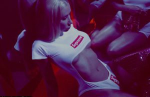 Iggy Azalea rocks Supreme Bodysuit and thigh high boots in these new racy images iggy azalea supreme bodysuit