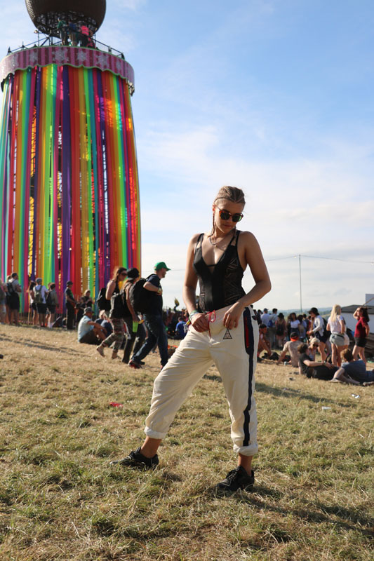 Tigerlily Taylor with head titled in Solitaire body at Glastonbury