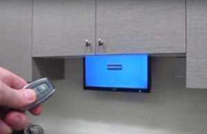 Build a Low-Budget Motorized Monitor Lift motorised monitor lift