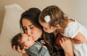 Bizarre Global Fertility Rituals Women holding a new born baby