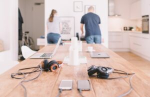 5 reasons why you should invest in a home printer couple working from home - home printer