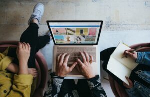 3 Tips for Successfully Launching a New Website photo of a person building a website on a laptop