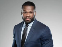Photo of 50 Cent wearing a suit
