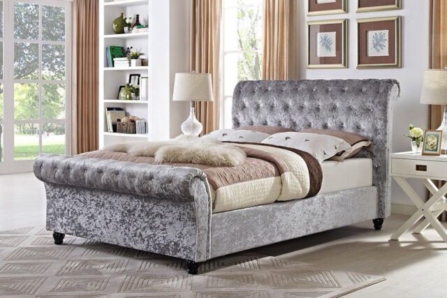 Photo of a silver chesterfield bed