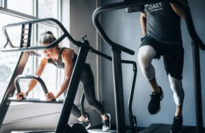 How to get the most out of going to the gym A woman a man using a running machine in a gym
