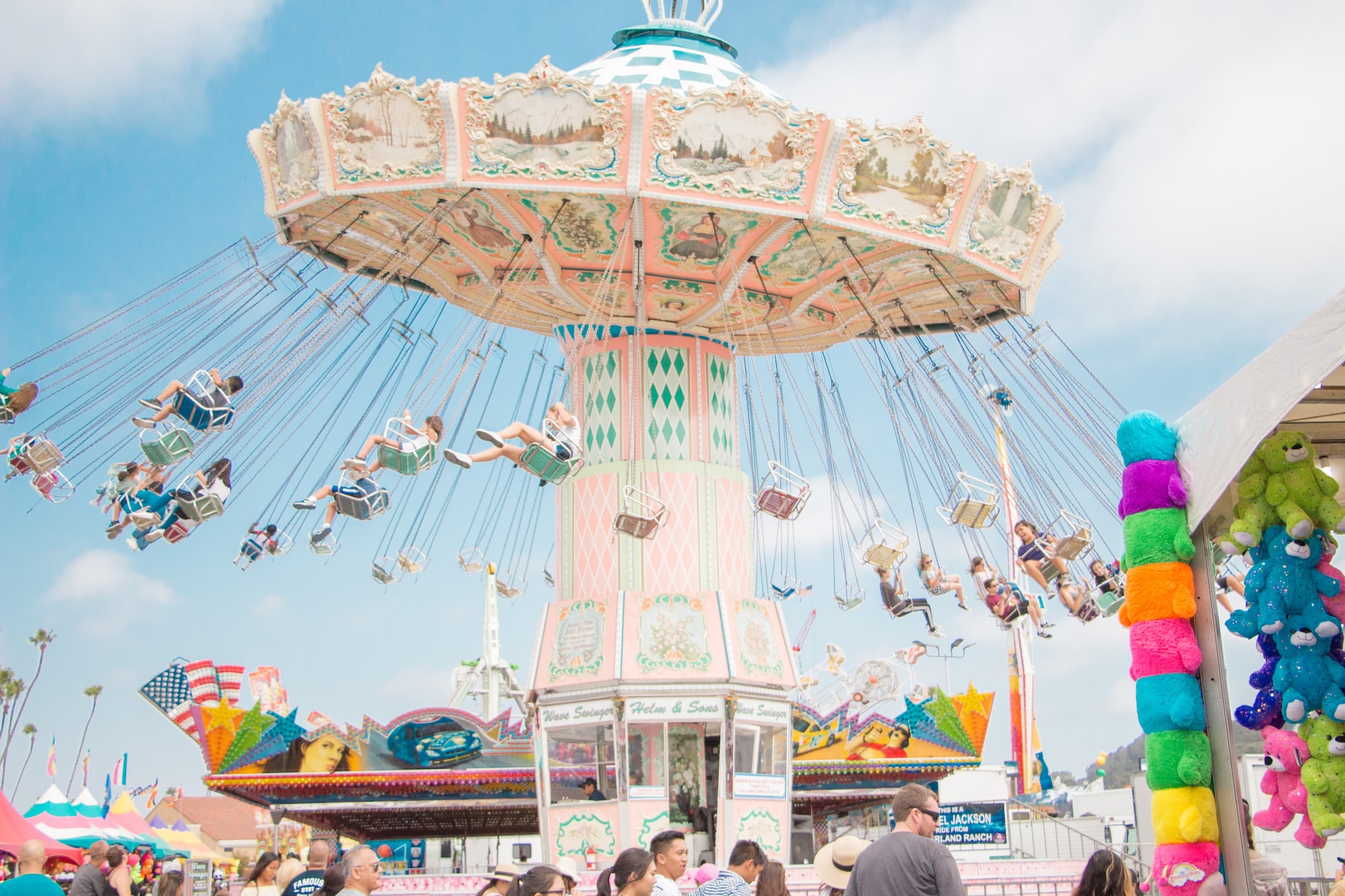 Photo of people riding a merry-go-round