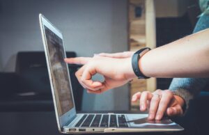 4 Ways to Futureproof Your High Street Business Person using a laptop