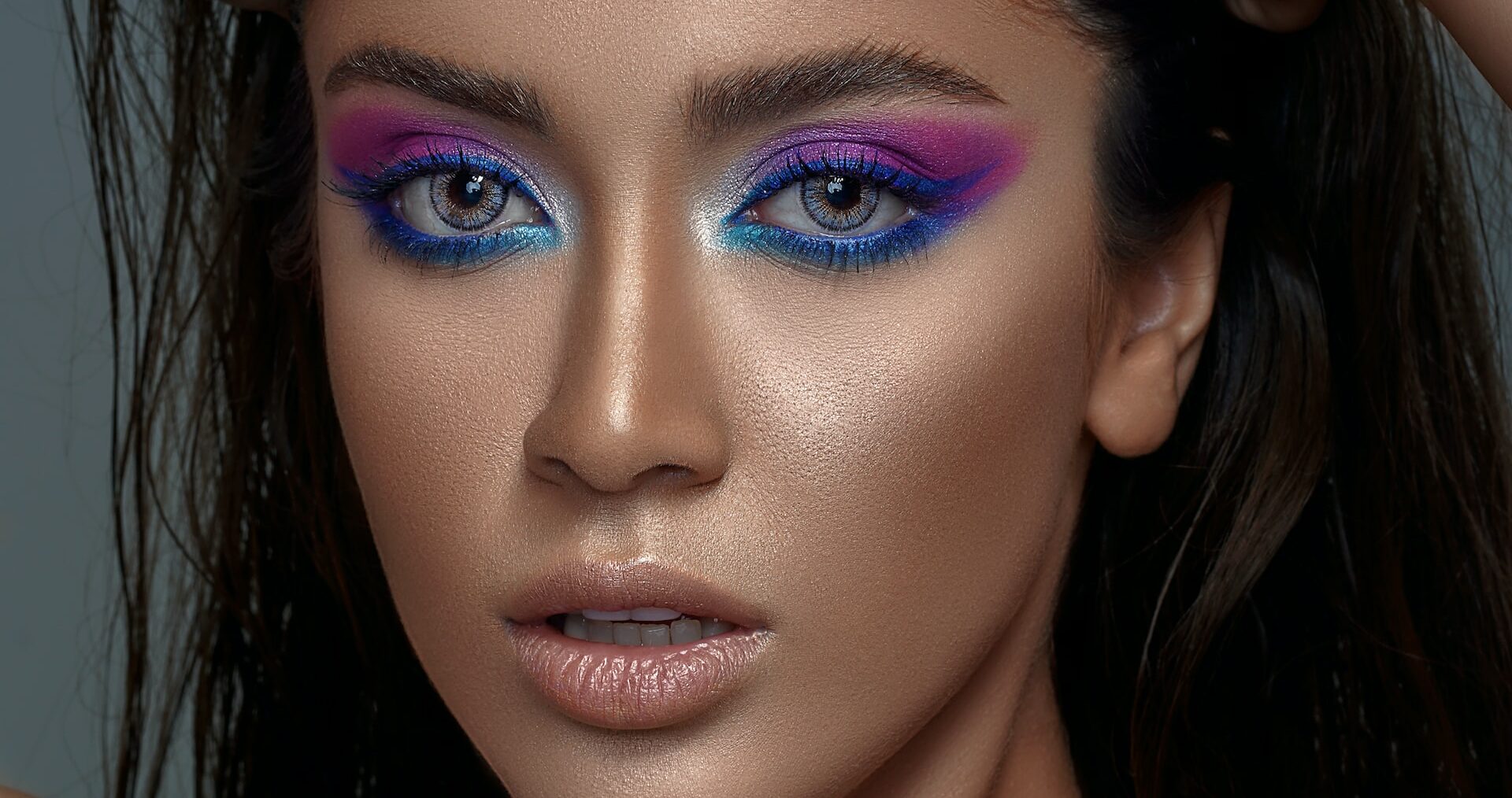 woman with blue and pink bright eyeshadow