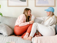 Autumn Nights In: Creating Warmth and Comfort at Home two women sitting at home on a couch