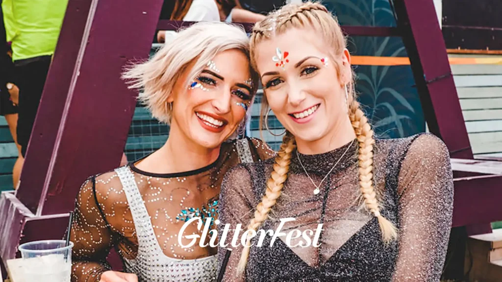Two ladies with glitter and gems at Glitterfest