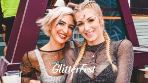 Two ladies with glitter and gems at Glitterfest