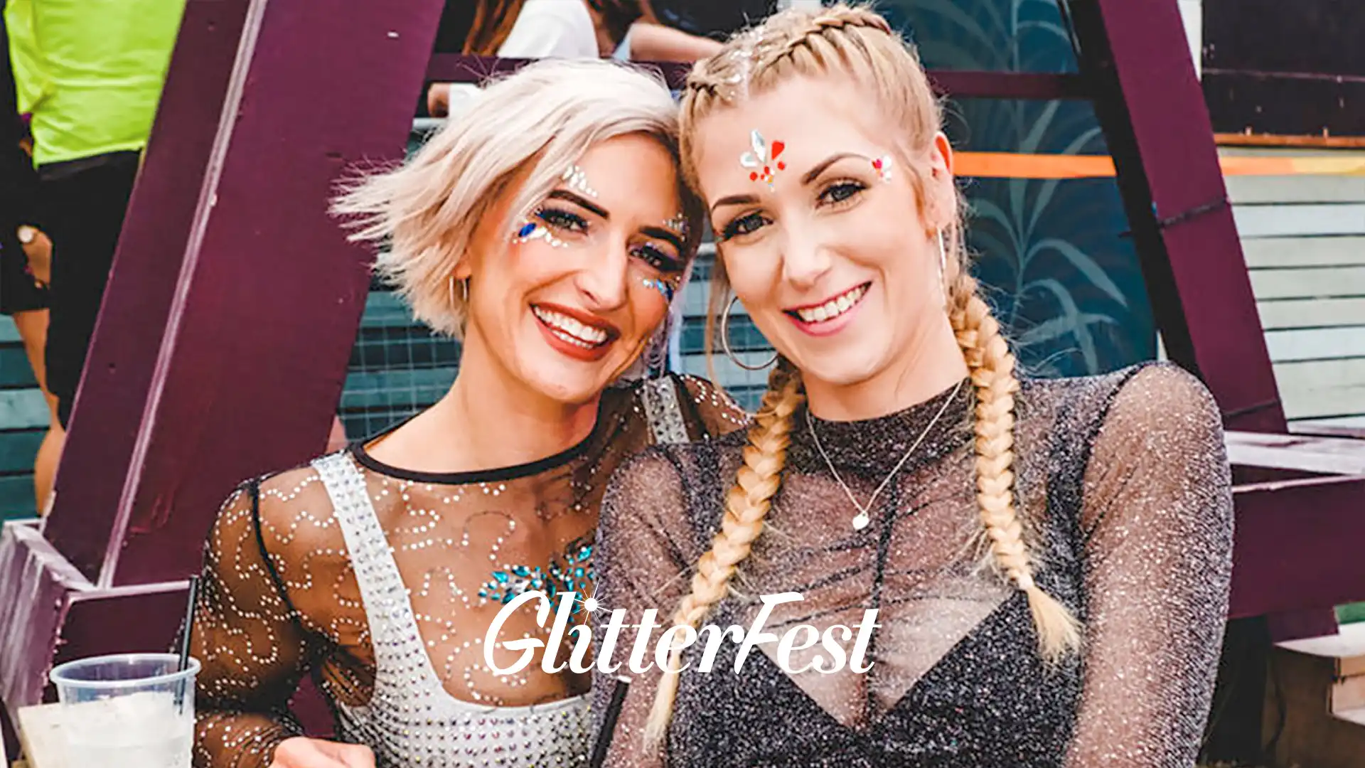 Two ladies with glitter and gems at Glitterfest