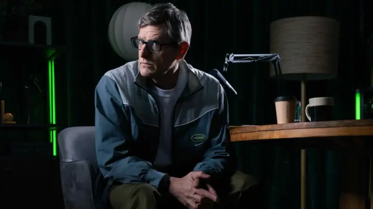 Louis Theroux holding Nike Air Max 95 OG Neon for JD Sports campaign