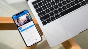 iPhone X next to a Macbook Pro